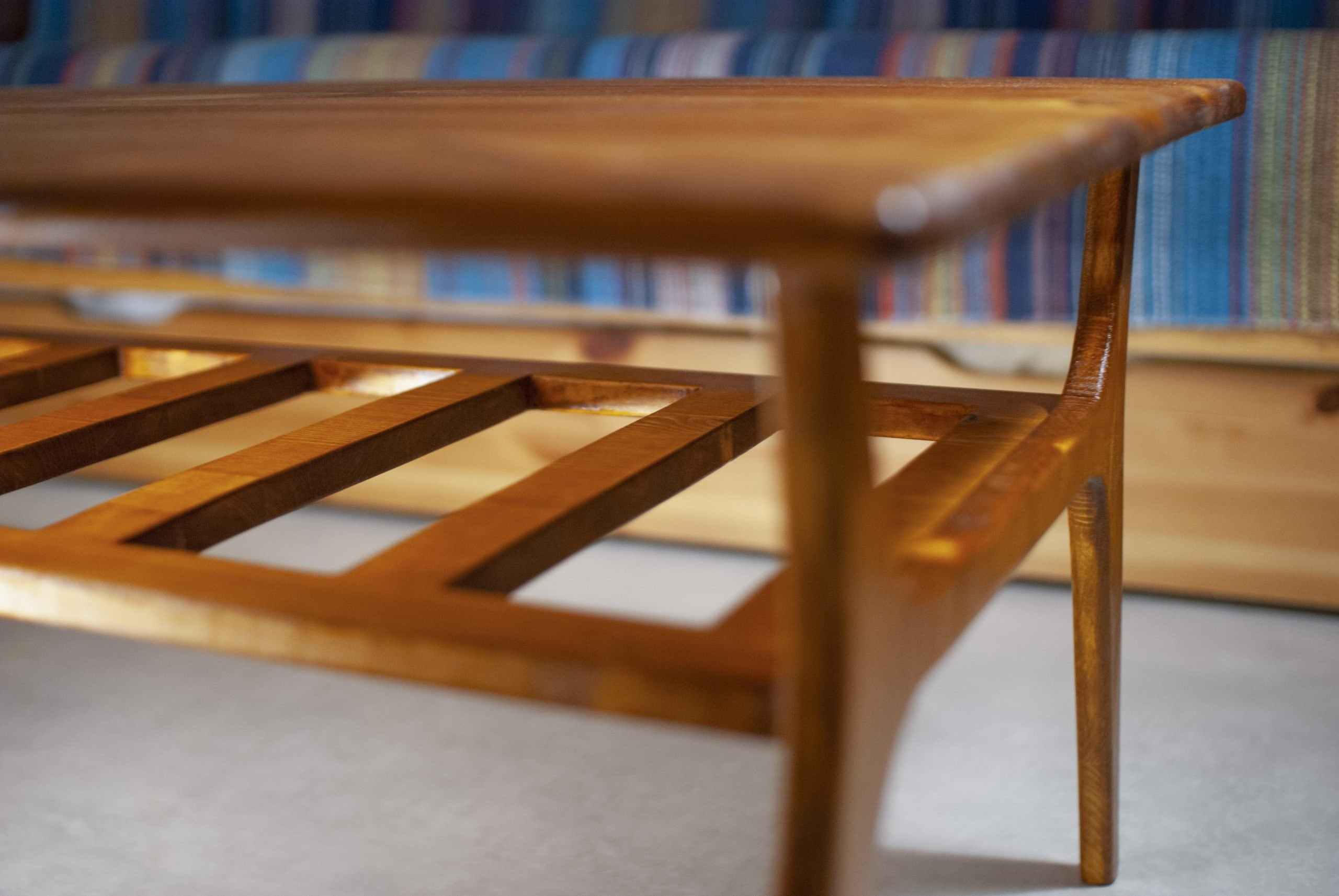 detail of the open shelf of a hand made coffee table